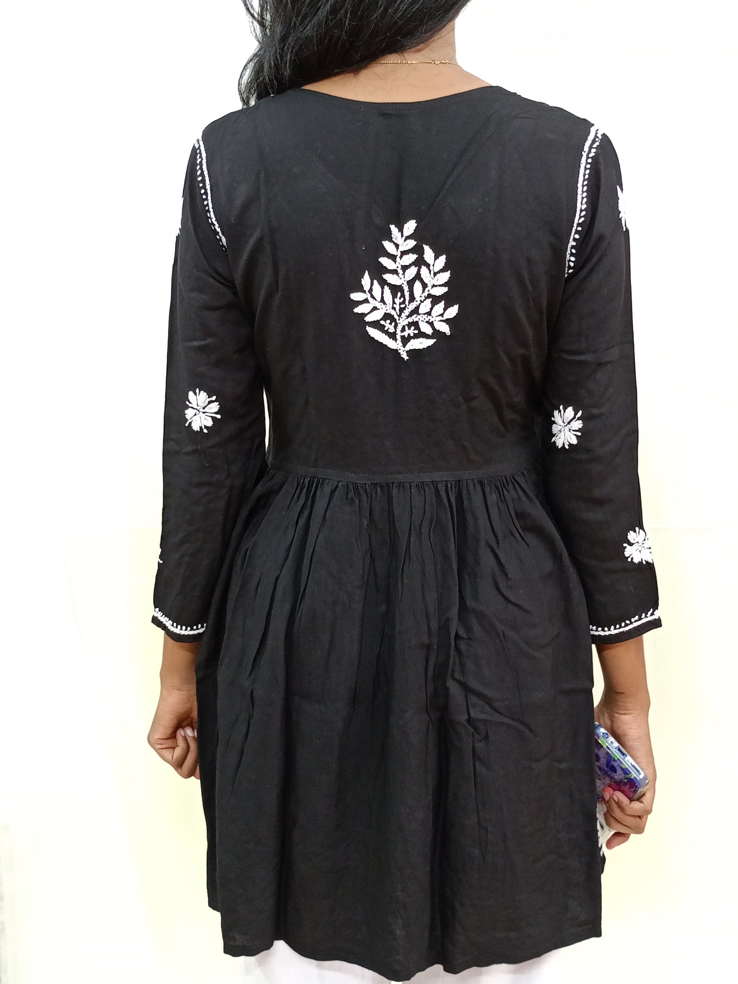 Peplum short kurti in black colour