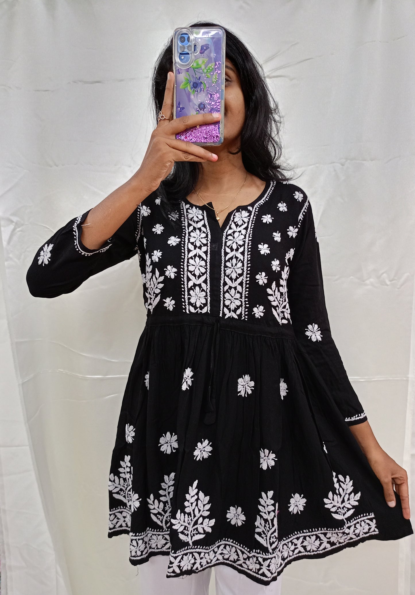 Peplum short kurti in black colour